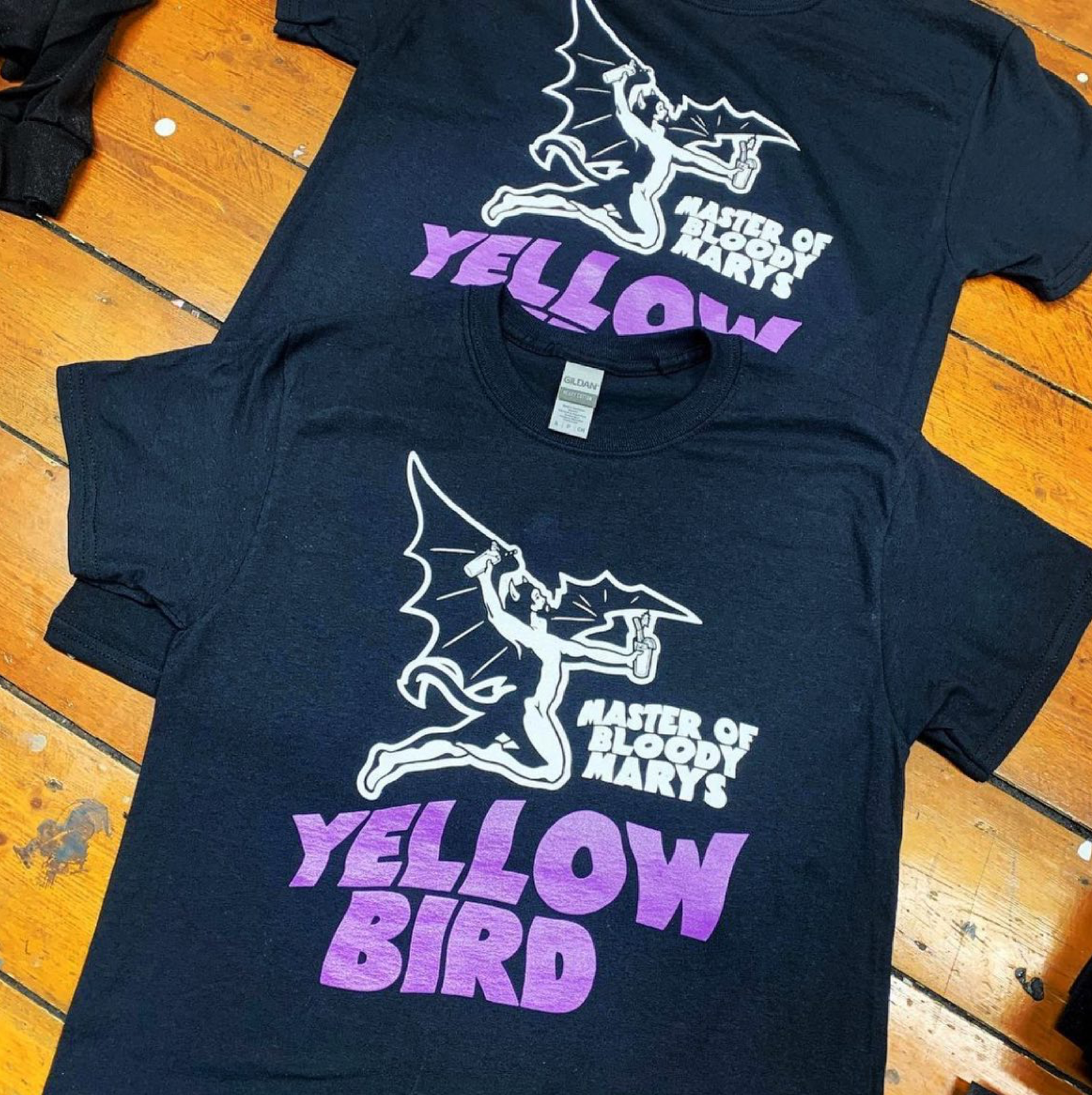 Yellow_Bird_Sabbath_Mary_T-shirt_On_Table